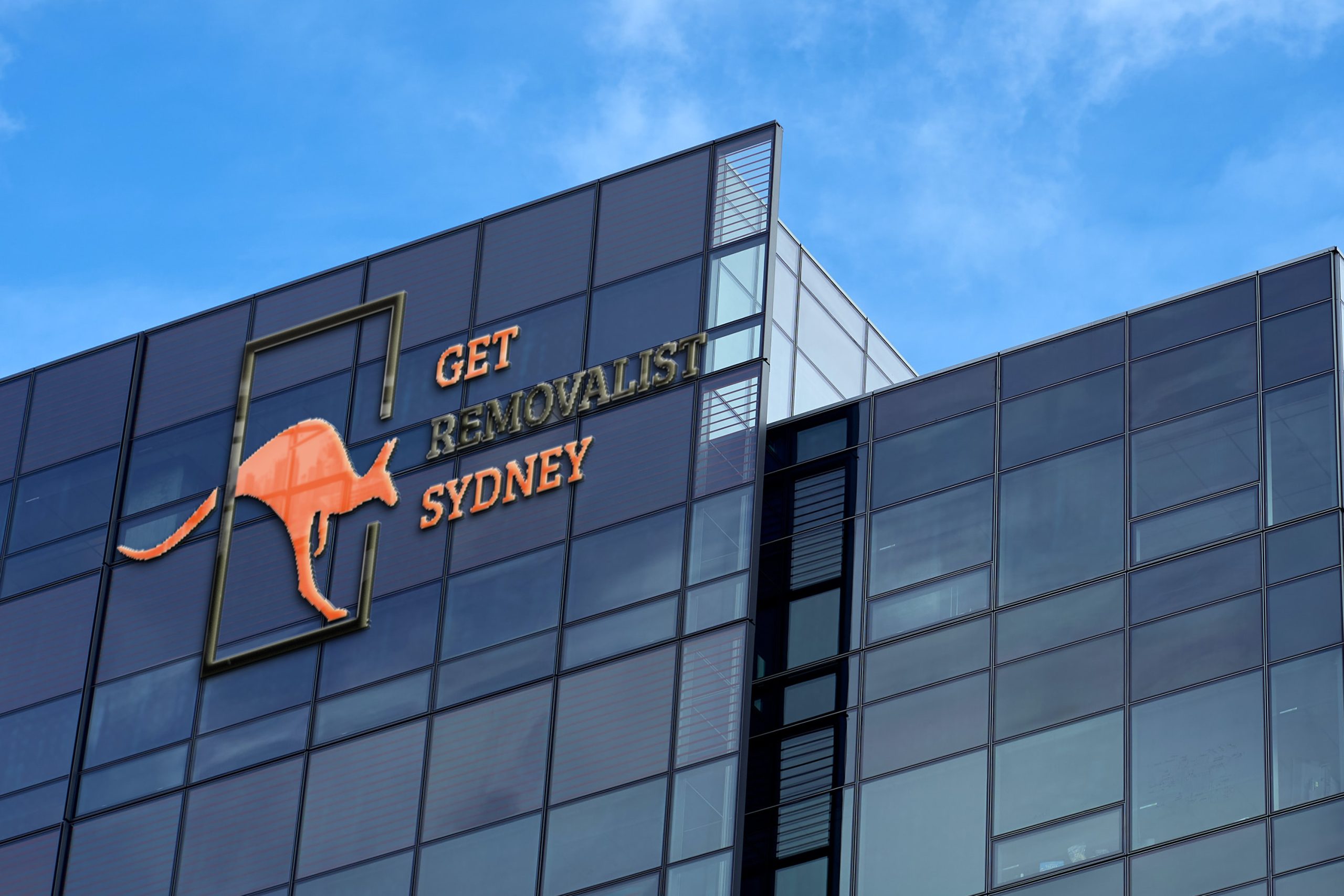 Professional team from Get Removalist Sydney carefully moving heavy furniture during a residential relocation.