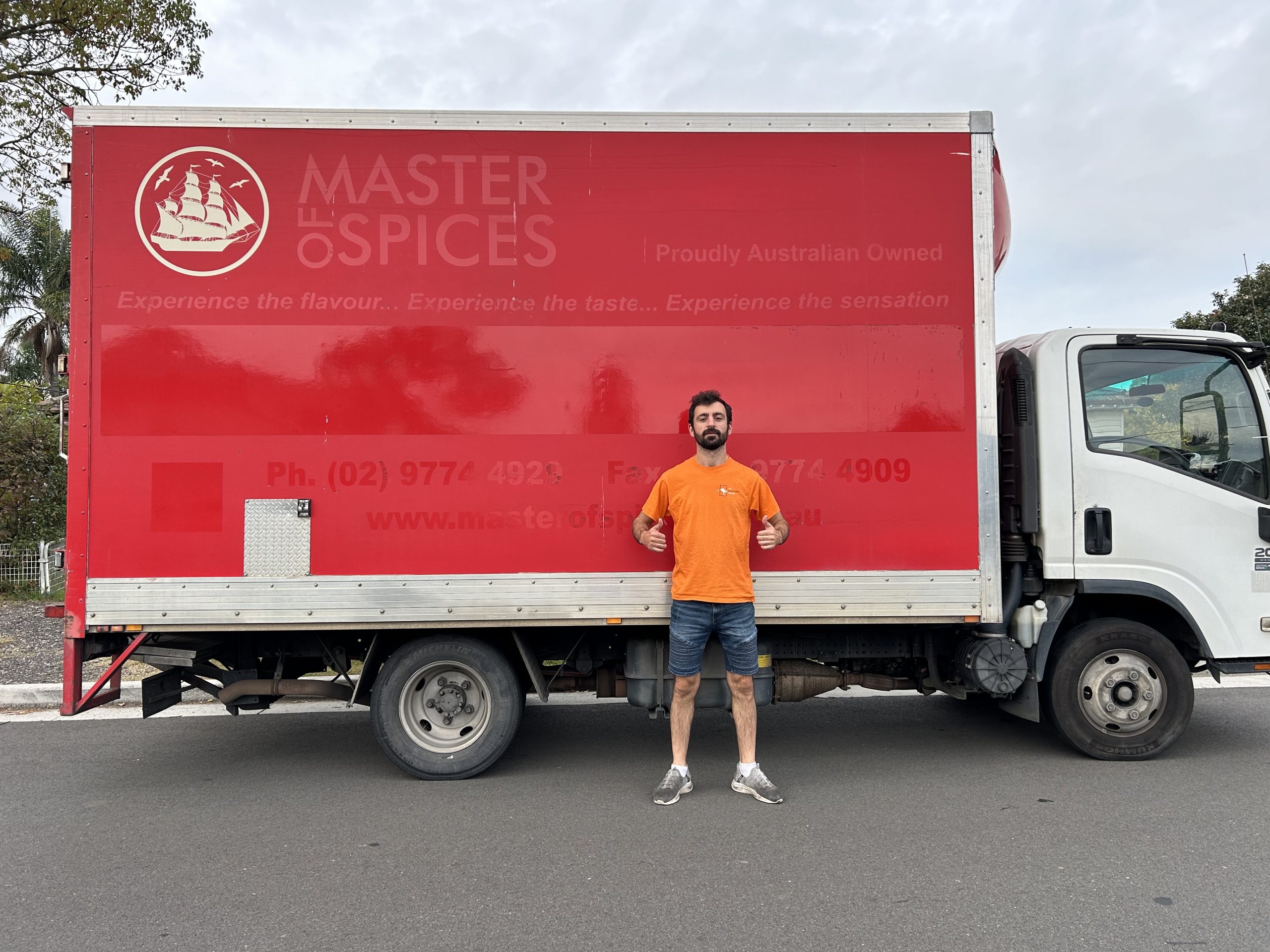 professional fast furniture removalist loading wrapped items into truck