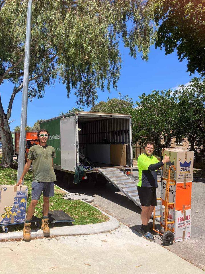 Double Bay Removalist team carefully loading furniture into moving truck